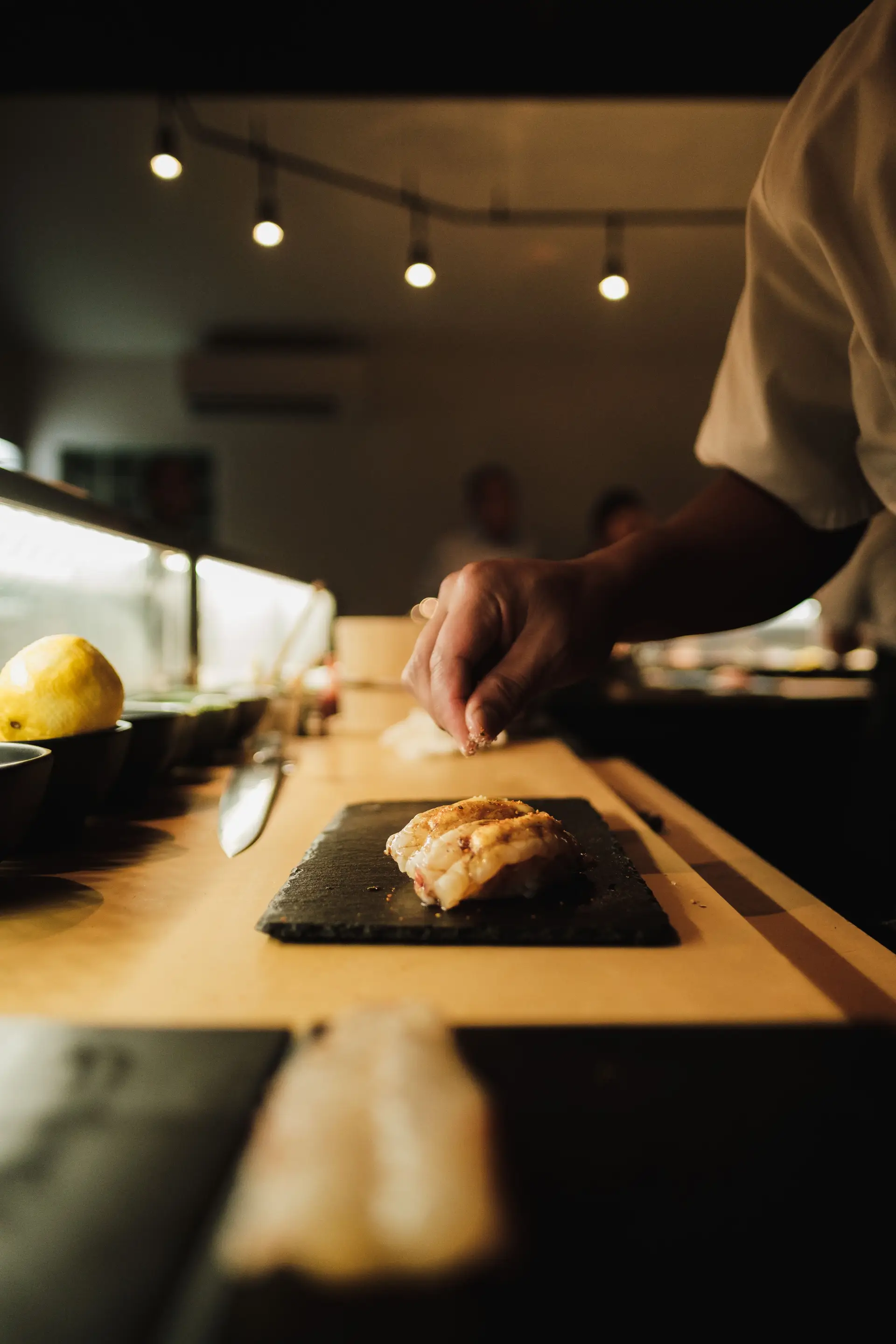 Chef preparing signature dish