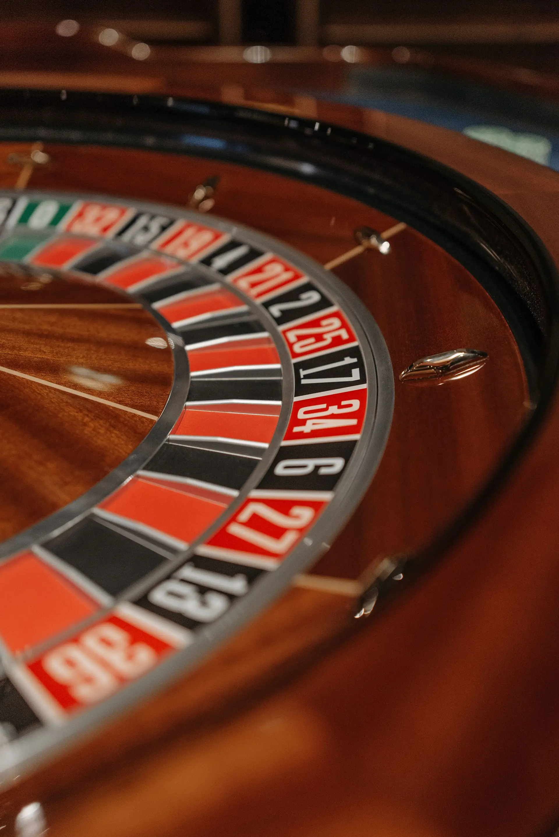 Close-up of a roulette wheel numbers, capturing the casino atmosphere